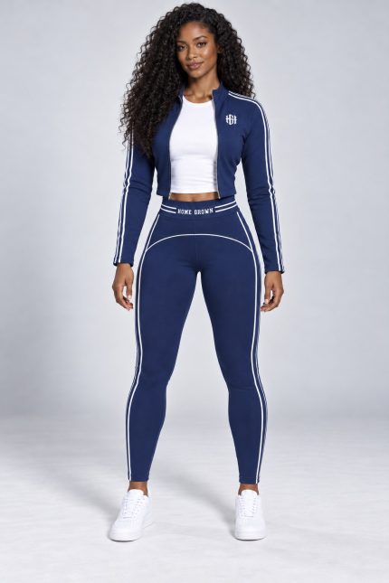 Home Grown Track Set in navy, front view: cropped zip track jacket with HGH monogram and white stripes, HOME GROWN waistband leggings
