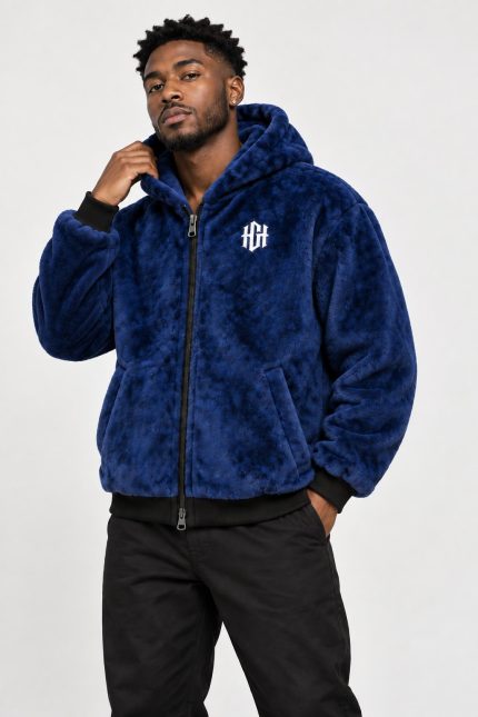 Model wearing the Home Grown Hustler Legacy Zip men's royal blue faux fur hoodie